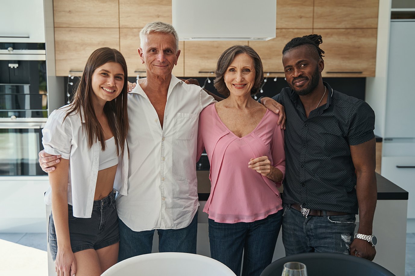 people-posing-for-family-portrait-at-home-2023-11-27-05-16-46-utc